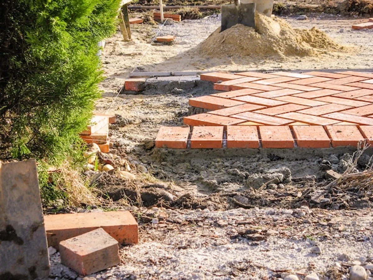 diy garden path process with reused bricks
