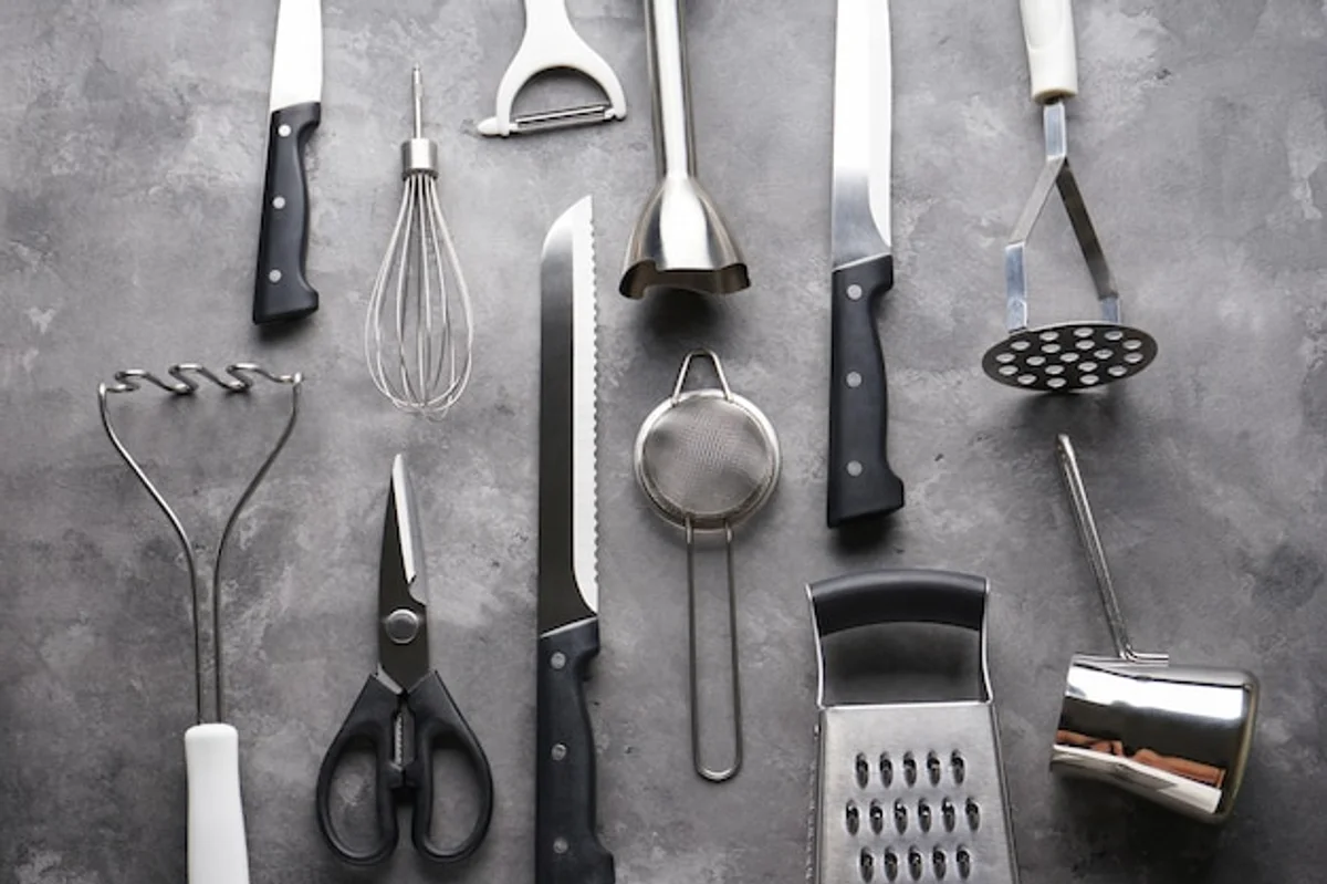 kitchen utensils used as gardening tools close up