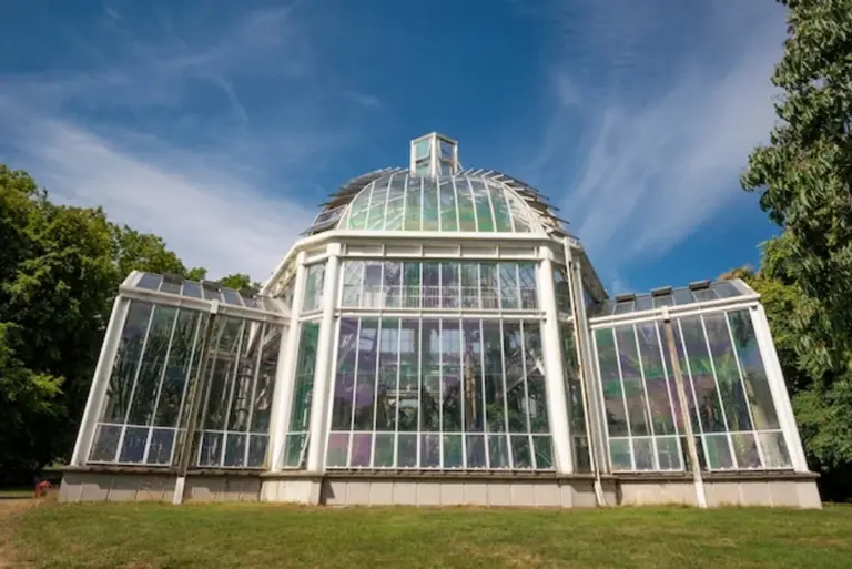 modern glass greenhouse exterior garden Germany