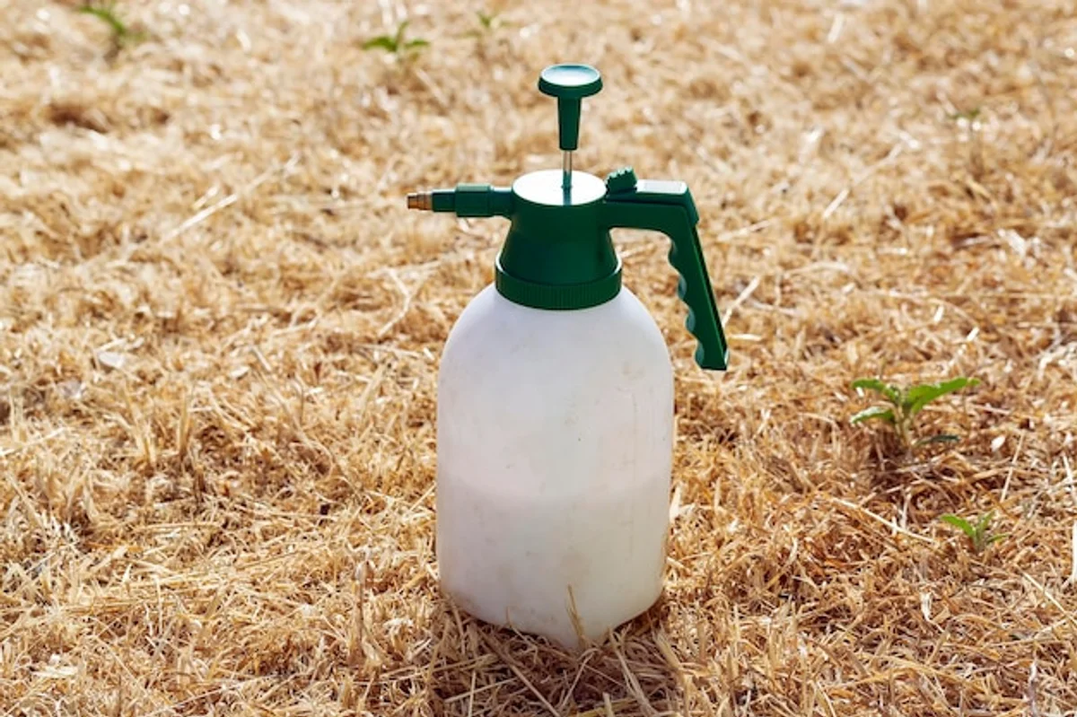 white vinegar bottle in garden