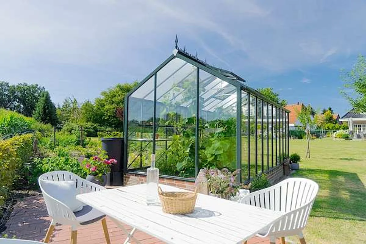 modern smart greenhouse exterior Germany spring garden