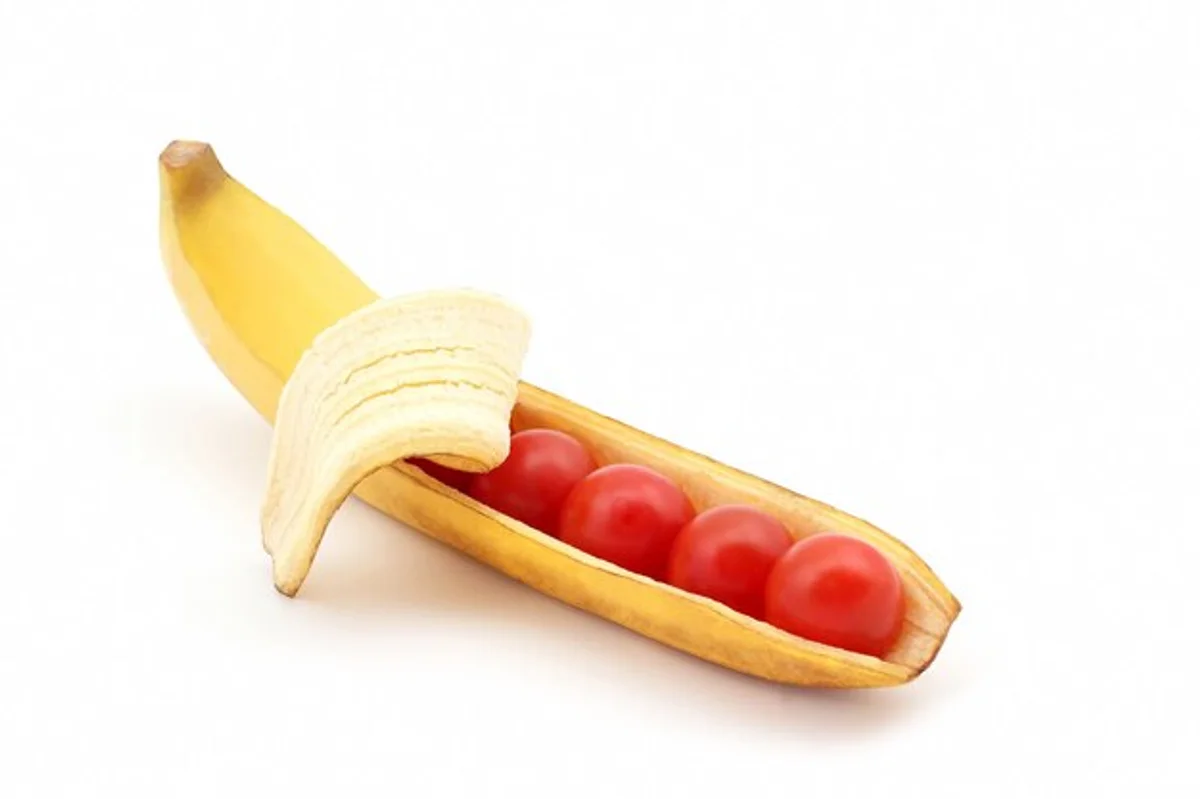 banana peels in garden with tomato plants